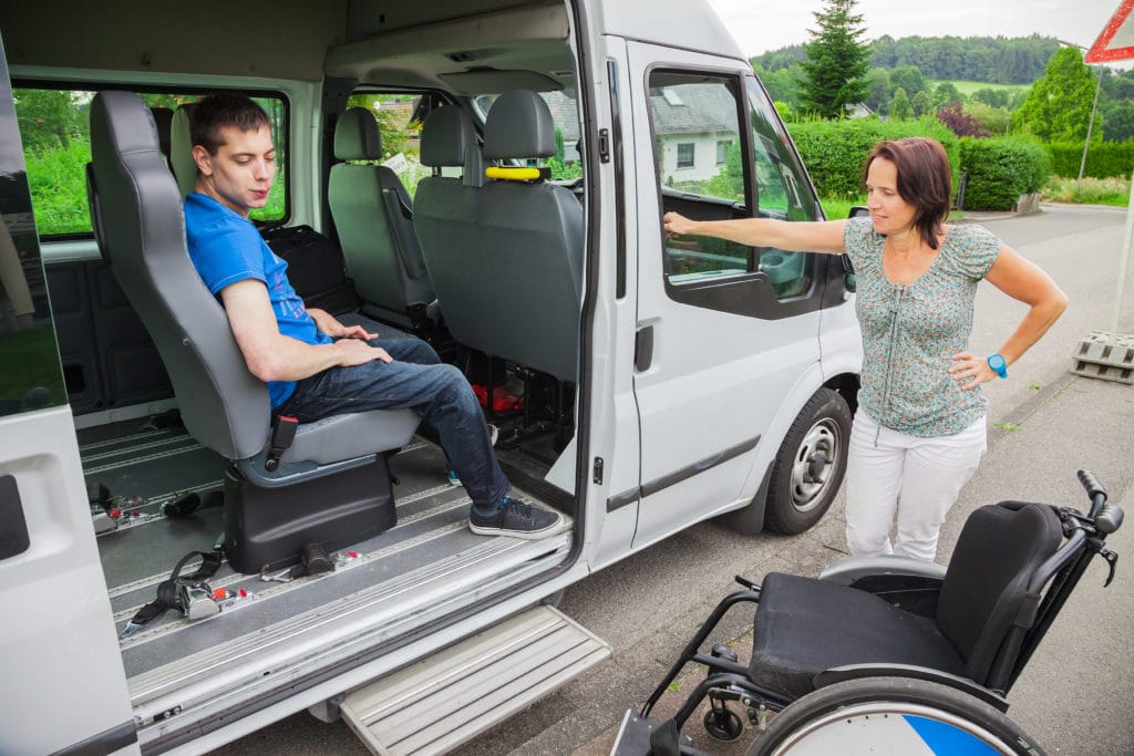 Handicapped Boy Is Picked Up By School Bus